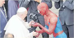  ?? Picture: REUTERS ?? Pope Francis greets a person dressed as Spiderman after the general audience, amid the coronaviru­s disease (COVID-19) pandemic, at the Vatican, June 23, 2021.