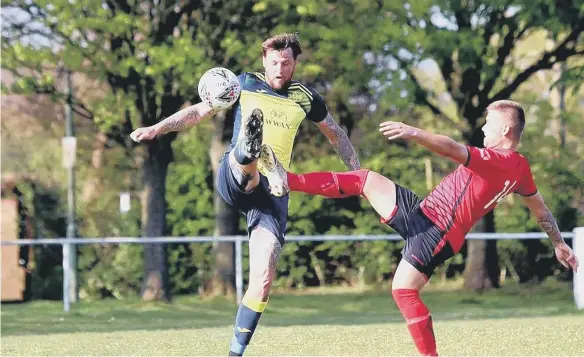  ?? ?? Defender Stanlie Hopkins, left, has signed for Wessex League new boys Fleetlands. Picture by Tom Phillips