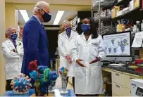  ?? Evan Vucci / Associated Press ?? President Joe Biden chats with Kizzmekia Corbett during his visit to the Viral Pathogenes­is Laboratory on Thursday.