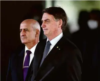  ?? Pedro Ladeira - 8.mai.20/Folhapress ?? O general Luiz Eduardo Ramos com Bolsonaro em evento da Defesa