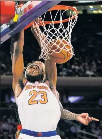  ?? Anthony J. Causi ?? DUNK TANKED: Mitchell Robinson and his dunking ability could be on the bench when the Knicks open the season Wednesday after he sprained his ankle in practice this week.