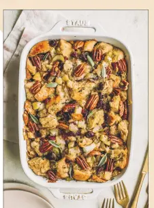  ?? COURTESY OF ELIZABETH VAN LIERDE ?? Elizabeth Van Lierde’s new cookbook, “Everyday Entertaini­ng,” devotes a chapter to holiday feasts with recipes such as roast turkey and this apple pecan stuffing.