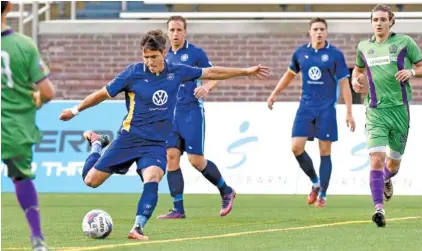  ?? STAFF PHOTOS BY ROBIN RUDD ?? Jose “Zeca” Ferraz scores for the Chattanoog­a Football Club in the sixth minute of Thursday’s match against the New Orleans Jesters at Finley Stadium. New Orleans answered with a goal in the 65th minute, and the NPSL Southeast Division match finished...