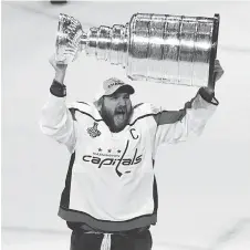  ?? ETHAN MILLER/GETTY IMAGES ?? The look of pure joy is impossible to miss as Alexander Ovechkin finally hoists the Stanley Cup at age 32 with the Washington Capitals, a team set up to make another run at it next year.