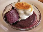  ?? PHOTO BY JIM BAILEY ?? A dish of Blueberry Lemon ‘Custard’ Pudding is shown.