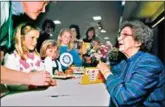  ?? (Vern Fisher/The Monterey County Herald via AP, File) ?? Beverly Cleary signs books April 19, 1998, at the Monterey Bay Book Festival in Monterey, Calif. The beloved children’s author, whose characters Ramona Quimby and Henry Huggins enthralled generation­s of youngsters, has died. She was 104.