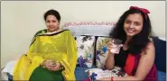  ??  ?? Parul Singh and her daughter in Patna, drinking ionized alkaline water.