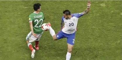  ??  ?? MEXICO CITY: Mexico’s Hirving Lozano (L) vies with US’s Geoff Cameron (R) during their 2018 FIFA World Cup Concacaf qualifier football match in Mexico City, on Sunday. — AFP