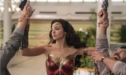  ??  ?? ‘Hands up who likes my film’ ... Gal Gadot boosts the ratings for Wonder Woman 1984. Photograph: Clay Enos/AP