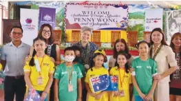  ?? ?? Australian Foreign Minister Penny Wong received a warm welcome from the students and coaches of Football for Humanity at the Ricrado P Cruz Sr. Elementary School in Taguig City