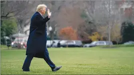  ?? STEFANI REYNOLDS / THE NEW YORK TIMES ?? President Donald Trump gestures Saturday while departing the White House en route to the Army-navy football game at the U.S. Military Academy in West Point, N.Y.