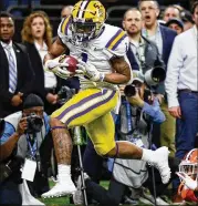  ?? SUE OGROCKI/ASSOCIATED PRESS ?? LSU’S Ja’marr Chase is considered the top receiver in the draft, slightly ahead of Alabama’s Jaylen Waddle and Heisman Trophy winner Devonta Smith.