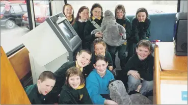  ?? ?? Pupils from Castletown­roche NS meeting ‘Séamí the Seal’ in the Green Bus promoting environmen­tal awareness, organised by Fermoy Leisure Centre.
