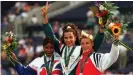  ??  ?? Ghada Shouaa (center) made history when she won gold at Atlanta in 1996
