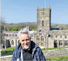  ?? St David depicted on a wall inside ?? hNational treasure: Griff in front of St David’s Cathedral