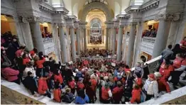  ?? TIMOTHY D. EASLEY/ASSOCIATED PRESS ?? Teachers from across Kentucky fill the state Capitol in Frankfort on Monday to rally for increased funding and to protest changes to their state-funded pension system.