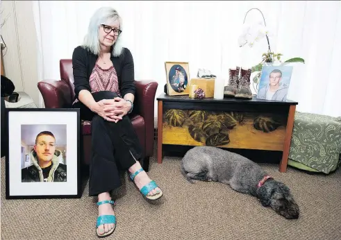  ?? GERRY KAHRMANN ?? Kat Wahamaa’s son Joseph died at age 25 of a fentanyl overdose. “It’s a public health emergency, like ebola and AIDS,” says the Maple Ridge mom, who surrounds herself with Joseph’s baby shoes, his constructi­on boots and a portrait of him as a toddler...