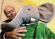  ?? Nathan Denette/Associated Press ?? Babar author Laurent de Brunhoff poses for a photograph in 2006 with Babar while celebratin­g 75 years of the book. De Brunhoff died Friday.