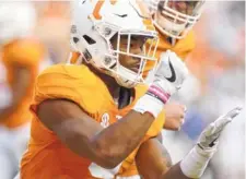  ?? STAFF FILE PHOTO BY ROBIN RUDD/TIMES FREE PRESS ?? Tennessee’s John Kelly celebrates a touchdown run against Tennessee Tech last season. Kelly led Vols running backs with 630 rushing yards last season and will be counted on to carry an even heavier load this year.