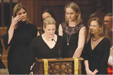  ?? Associated Press photo ?? Jenna Bush, left, wipes away tears as granddaute­rs gather to speak during a funeral service for former first lady Barbara Bush at St. Martin's Episcopal Church, Saturday in Houston.