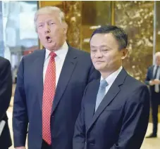  ?? — AFP ?? Jack Ma (R), founder of Alibaba Group and President-elect Donald Trump speak to the media after their meeting at Trump Tower.