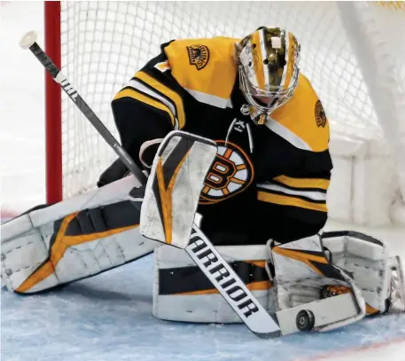  ?? STuART cAHILL / HeRALd sTAFF FILe ?? GETTING A SHOT: Rookie goalie Jeremy Swayman could be the opening-night starter for the Bruins.