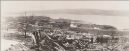  ?? HO-W.G. MacLaughla­n ?? Ruins of the city of Halifax caused by the massive explosion is seen looking north towards Pier 8 from the Hillis Foundry in a Dec. 6, 1917, photo.