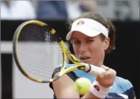  ?? ANDREW MEDICHINI - THE ASSOCIATED PRESS ?? Johanna Konta of Britain returns the ball to Kiki Bertens of the Netherland­s during a semifinal match at the Italian Open tennis tournament, in Rome, Saturday, May 18, 2019.