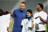  ?? ?? England captain Harry Kane (left) poses for a photo during a welcoming event. — reuters