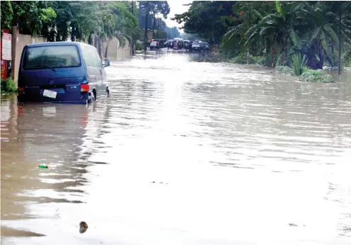 ?? Photo: Benedict Uwalaka ?? Flood caused by heavy downpour along Adekunle Fajuyi Road at G.R.A Ikeja, Lagos yesterday.