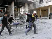  ?? SYRIAN CIVIL DEFENSE WHITE HELMETS FILE 2018 ?? Syrian rescue workers known as the White Helmets were evacuated from a dangerous area of Syria through a coordinate­d effort by Israel, the U.S. and European allies.