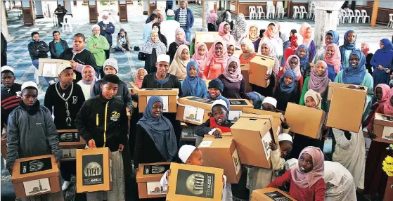  ??  ?? OPEN HEARTS: The Eid Angels initiative will culminate in the distributi­on of personalis­ed boxes for orphans, from Woodstock and Gugulethu, tomorrow.