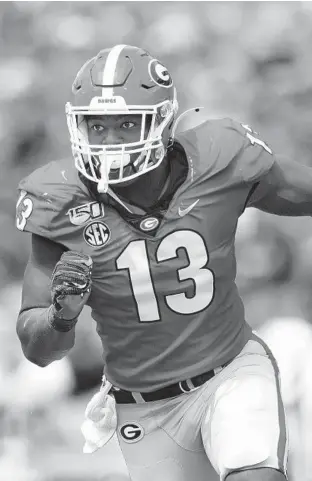  ?? JOHN AMIS/AP ?? Georgia linebacker Azeez Ojulari rushes the Arkansas State line in 2019.