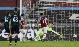  ??  ?? Jesse Lingard scores on the rebound after his penalty was saved. Photograph: Tom Jenkins/The Guardian