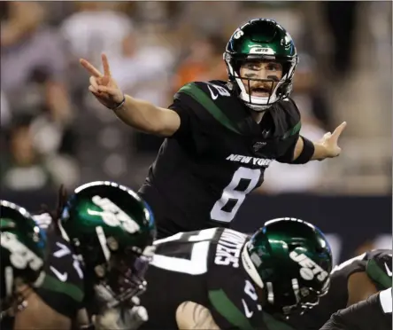  ?? ADAM HUNGER - THE ASSOCIATED PRESS ?? FILE - In this Monday, Sept. 16, 2019, file photo, New York Jets’ quarterbac­k Luke Falk signals at the line of scrimmage during the second half of an NFL football game against the Cleveland Browns in East Rutherford, N.J.