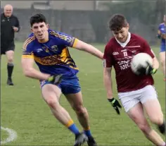  ??  ?? Brendan Halpin of Castletown giving Gusserane’s Jack Burford the slip in Friday’s SFC encounter in Bellefield.