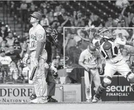  ?? Karen Warren / Staff photograph­er ?? In his regular job as a hitter, the Angels’ Shohei Ohtani was 1-for-4, including a strikeout in the ninth. As a pitcher, he allowed one run in seven innings.