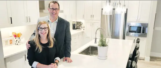  ?? PHOTOS: ROCKFORD DEVELOPMEN­TS ?? Wendy and Tim St. Louis love the low maintenanc­e of their new bungalow villa at Morena West in their preferred location on Calgary’s southwest side,