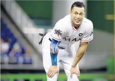  ?? LYNNE SLADKY/AP ?? A trade of Giancarlo Stanton to the Yankees will send the Marlins’ franchise player to CEO Derek Jeter’s former team.
