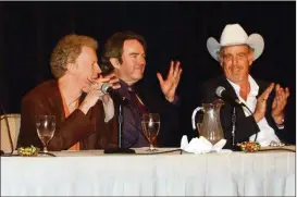  ?? AMERICAN-STATESMAN TAYLOR JOHNSON / ?? Jimmy Webb, center, talks with Terry Lickona, producer of “Austin City Limits,” left, and Asleep at the Wheel’s Ray Benson at a 2003 ASCAP meeting in Austin.