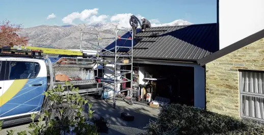  ?? PHOTOS: KERRIE WATERWORTH ?? Early days . . . One of the first solarZero installati­ons on a house in Wanaka last year.