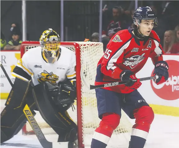  ?? DAN JANISSE ?? Sarnia Sting goaltender Benjamin Gaudreau keeps an eye on Wyatt Johnson of the Windsor Spitfires during Thursday's game at the WFCU Centre in Windsor.