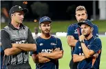  ??  ?? Coach Mike Hesson, right, and the Black Caps have some thinking to do to reverse their recent T20 slide.