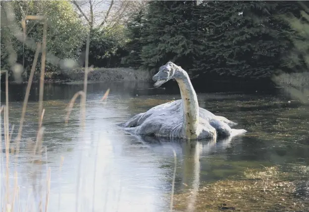  ??  ?? 0 The Loch Ness monster is not only a mystery but also a tourist attraction – this model of Nessie is a feature at the Loch Ness Centre and Exhibition, Drumnadroc­hi