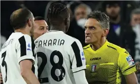  ?? Photograph: Anadolu Agency/Getty Images ?? Referee Massimilan­o Irrati, showing his frustratio­n with the protests of Giorgio Chiellini and Denis Zakaria, endured a dramatic match.