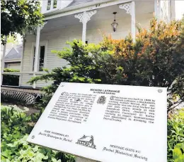  ?? JOHN MAHONEY ?? A heritage plaque is posted on the lawn in front of Maison LaFrance at 18 Martin Ave. in Dorval. The city of Dorval has agreed to a demolition request for the home, which dates back to 1888.