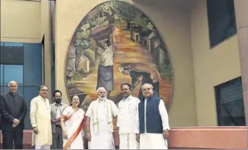  ?? PTI ?? Prime Minister Narendra Modi with Lok Sabha Speaker Sumitra Mahajan and other leaders after inaugurati­ng the Parliament House Annexe Extension Building in New Delhi on Monday. The building has two blocks spread over 39,495 square metres and houses...