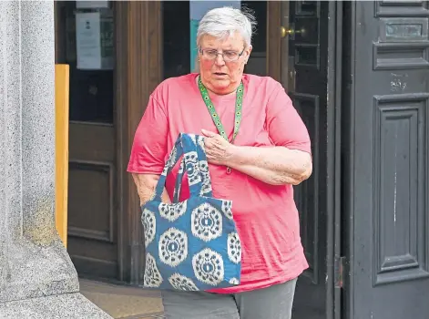  ??  ?? ACT OF OMISSION: Gail Vines leaving Aberdeen Sheriff Court after being sentenced by Sheriff Mann.