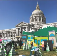  ?? Peter Hartlaub / The Chronicle ?? A scene from the TV series “South Park” is set up in front of San Francisco’s City Hall for Comedy Central Presents Clusterfes­t, a comedy and music festival that runs through Sunday.