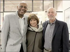  ??  ?? UALR men’s basketball Coach Darrell Walker with Sheila and Gene Castin